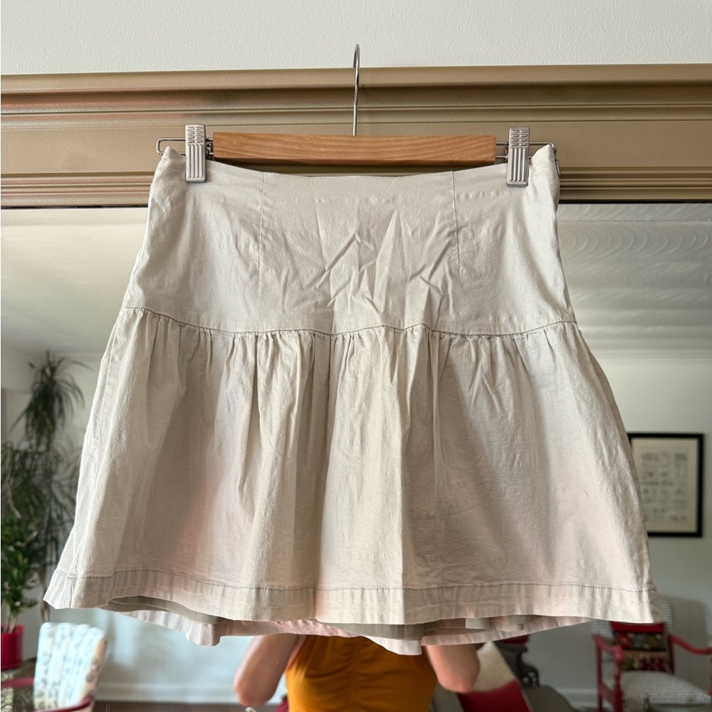 DROP WAIST CREAM MINI SKIRT